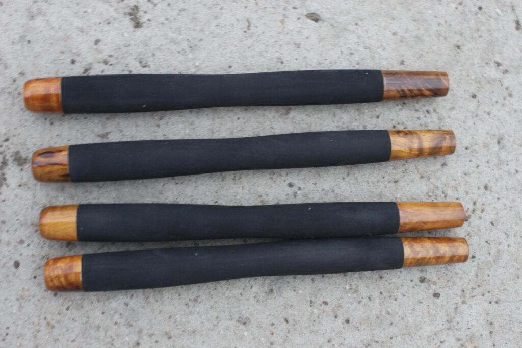 Tanuki 425 tenkara rod grip showing black EVA handle with wooden end inserts